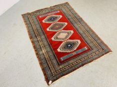 VINTAGE BOKHARA RUG ON A MAINLY RED BACKGROUND - L 177CM. W 125CM.