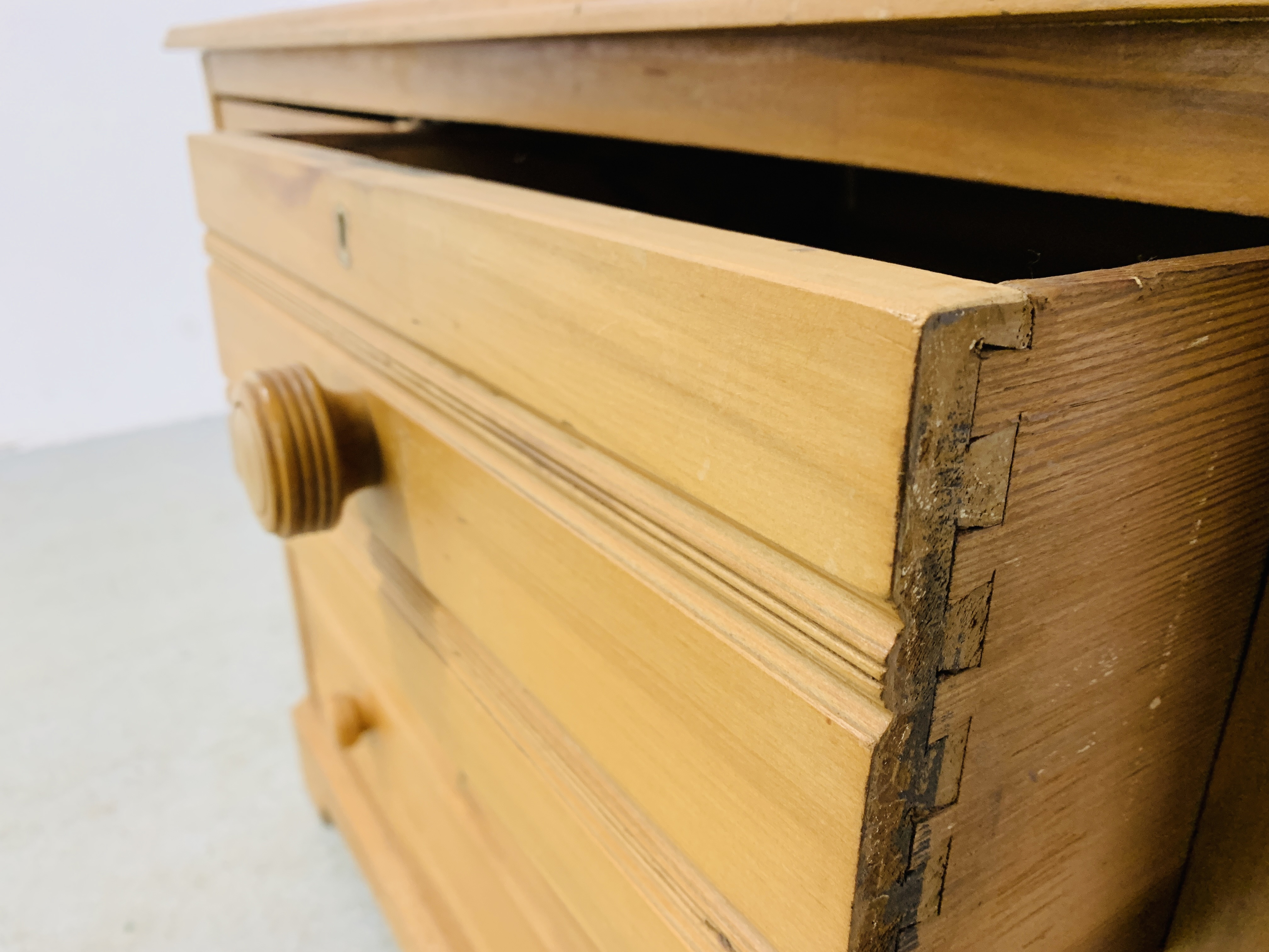 WAXED PINE TWO OVER TWO DRAWER CHEST WITH TURNED HANDLES - W 107CM. D 55CM. H 87CM. - Image 7 of 7