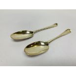 A PAIR OF GEORGE I SILVER SERVING SPOONS,