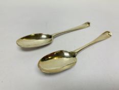 A PAIR OF GEORGE I SILVER SERVING SPOONS,