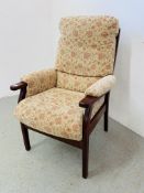 A HIGH SEAT UPHOLSTERED EASY CHAIR