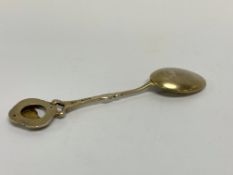 OF TITANIC INTEREST: A SILVER AND ENAMEL SPOON FROM THE SISTER SHIP OF THE TITANIC, RMS OCEANIC,