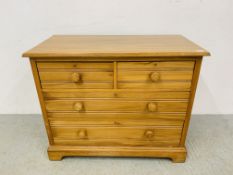 WAXED PINE TWO OVER TWO DRAWER CHEST WITH TURNED HANDLES - W 107CM. D 55CM. H 87CM.
