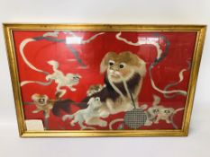 AN EARLY C20TH FRAMED PEKING SILK EMBROIDERY OF "SHORT DOGS" ON A RED BACKGROUND - H 50CM. W 80CM.