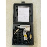 A CASED SIP ½ INCH AIR IMPACT WRENCH WITH INSTRUCTIONS AND ACCESSORIES ALONG WITH A COMPACT DIGITAL