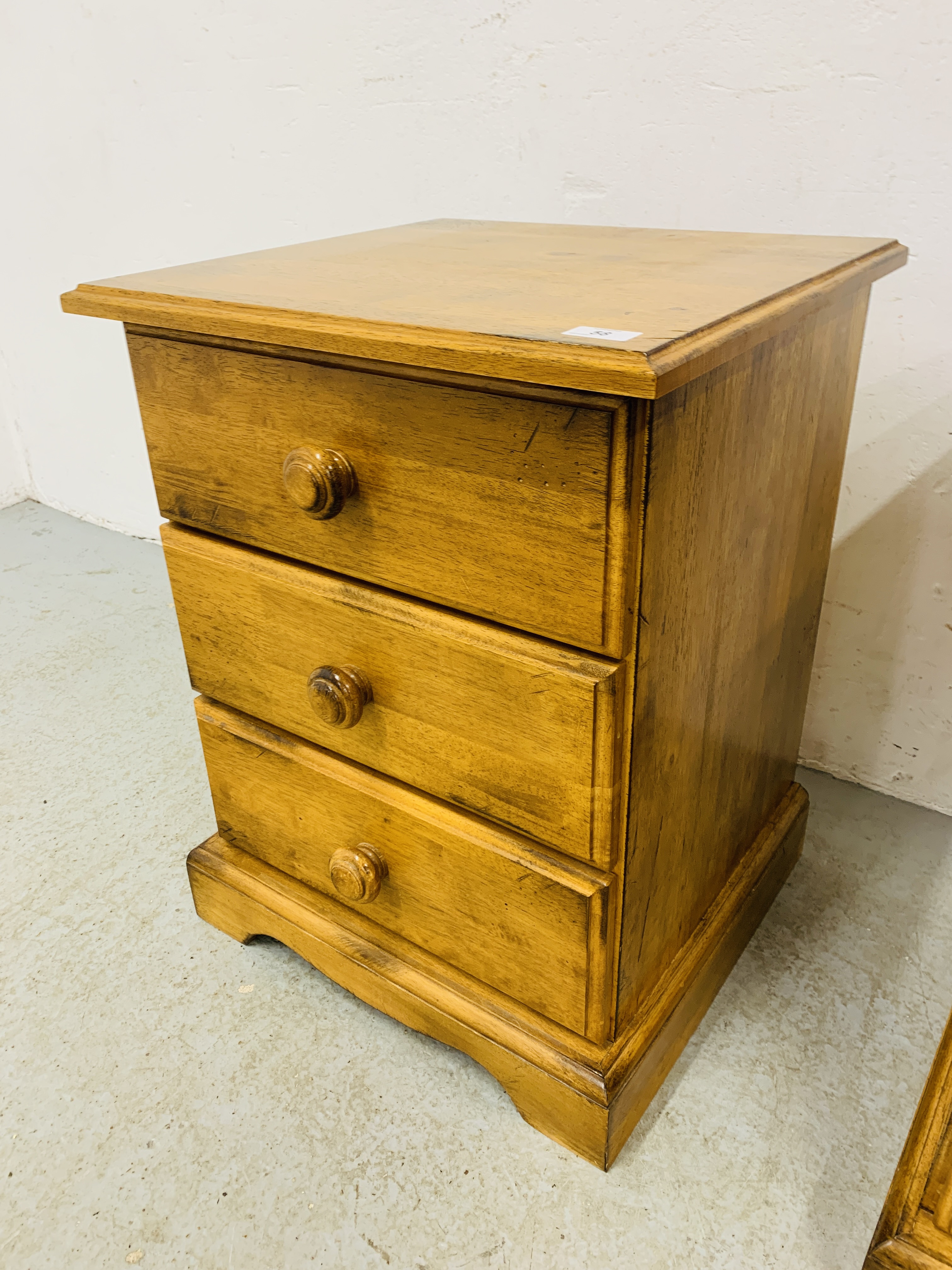 PAIR OF MODERN HARDWOOD 3 DRAWER BEDSIDE CHESTS, WITH TURNED HANDLES - W 49CM. D 46CM. H 63CM. - Image 5 of 6