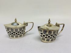 A PAIR OF SILVER BOAT-SHAPED MUSTARDS WITH PIERCED SIDES, MAKER WO,