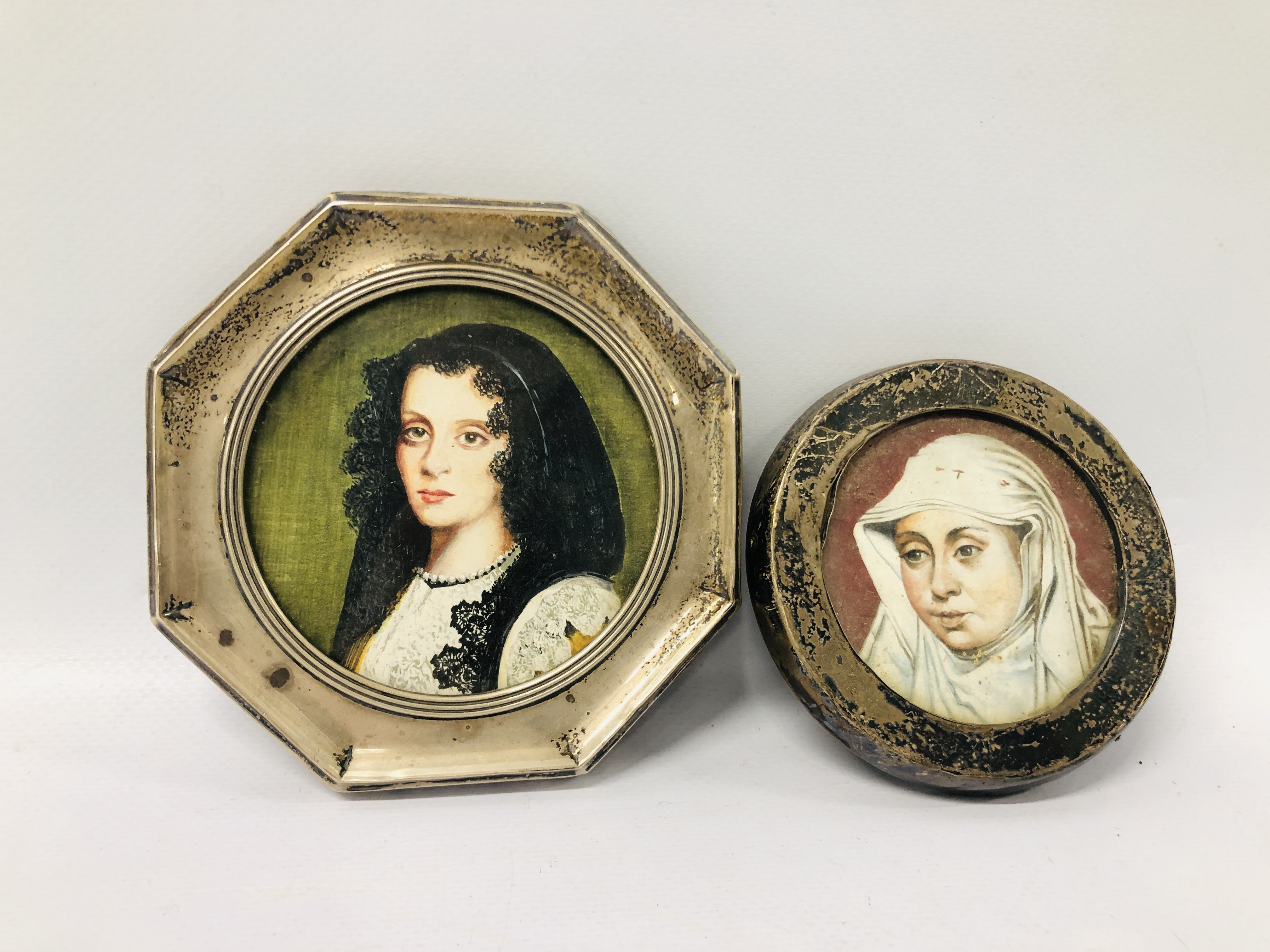 A SILVER OCTAGONAL PICTURE FRAME WITH A PRINT AFTER VELAZQEZ ALONG WITH A FURTHER SILVER CIRCULAR