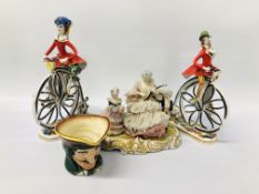PAIR OF ITALIAN ORNAMENTS "LADY'S UPON PENNY FARTHINGS" H 24CM ALONG WITH A FIGURED CABINET