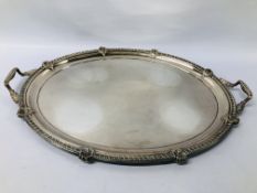 AN IMPRESSIVE OVAL SILVER PLATED TWIN HANDLED SERVING TRAY - L 58CM. W 47CM.