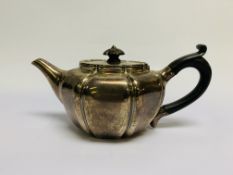 AN EDWARDIAN SILVER TEAPOT BY JOHN VANDER, LON.