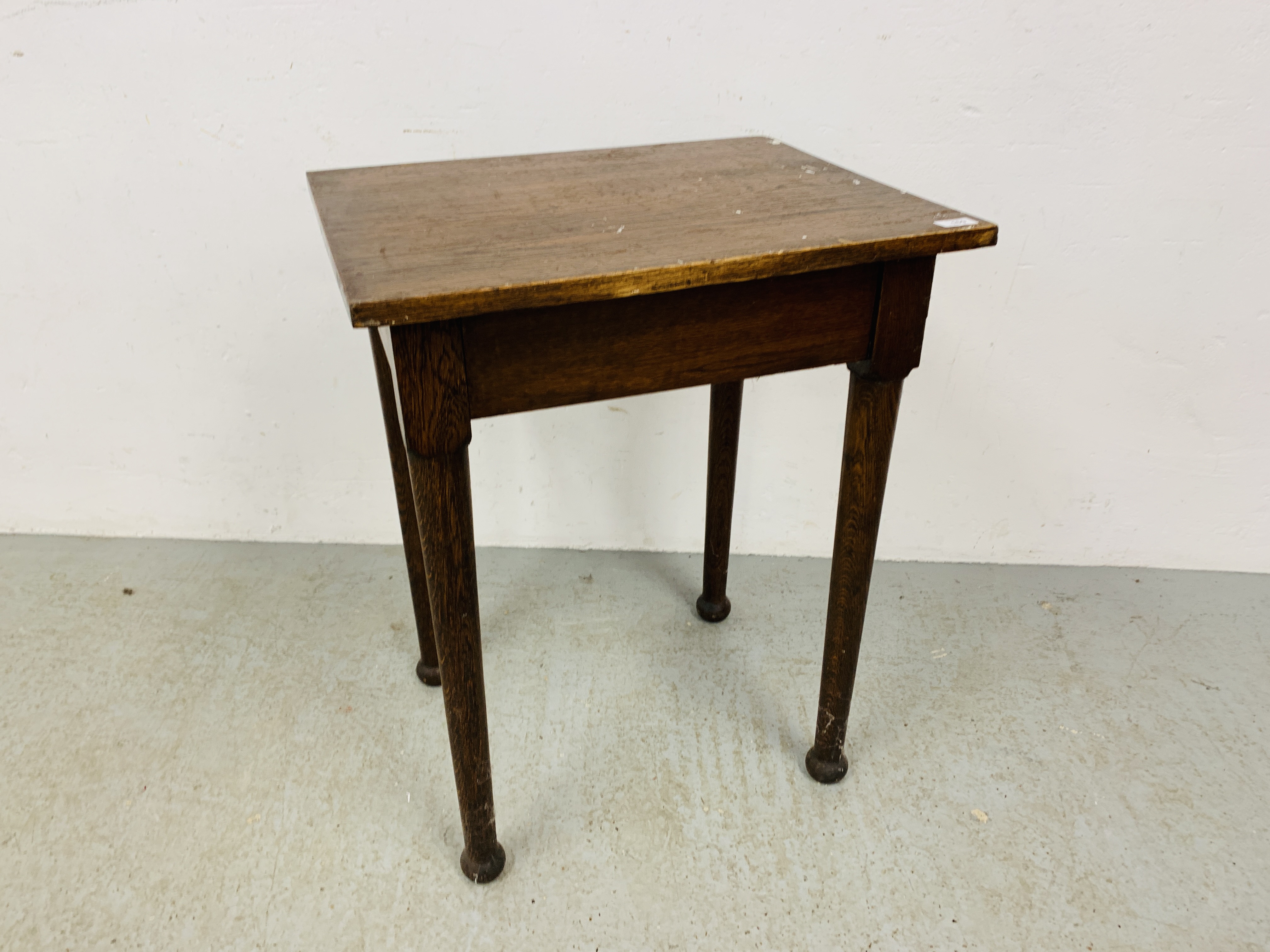 AN EDWARDIAN OAK RECTANGULAR OCCASIONAL TABLE