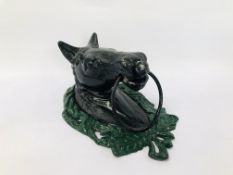 A CAST IRON HORSE HEAD WALL MOUNT TOWEL RING