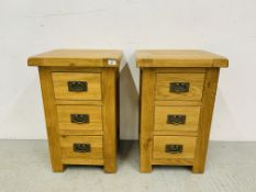 PAIR OF MODERN LIGHT OAK FINISH THREE DRAWER BEDSIDE CHESTS - W 45CM. D 40CM. H 70CM.