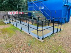 A SECTIONAL GALVANISED STEEL FRAME DISABILITY ACCESS RAMP COMPLETE WITH HANDRAILS AND ADJUSTABLE