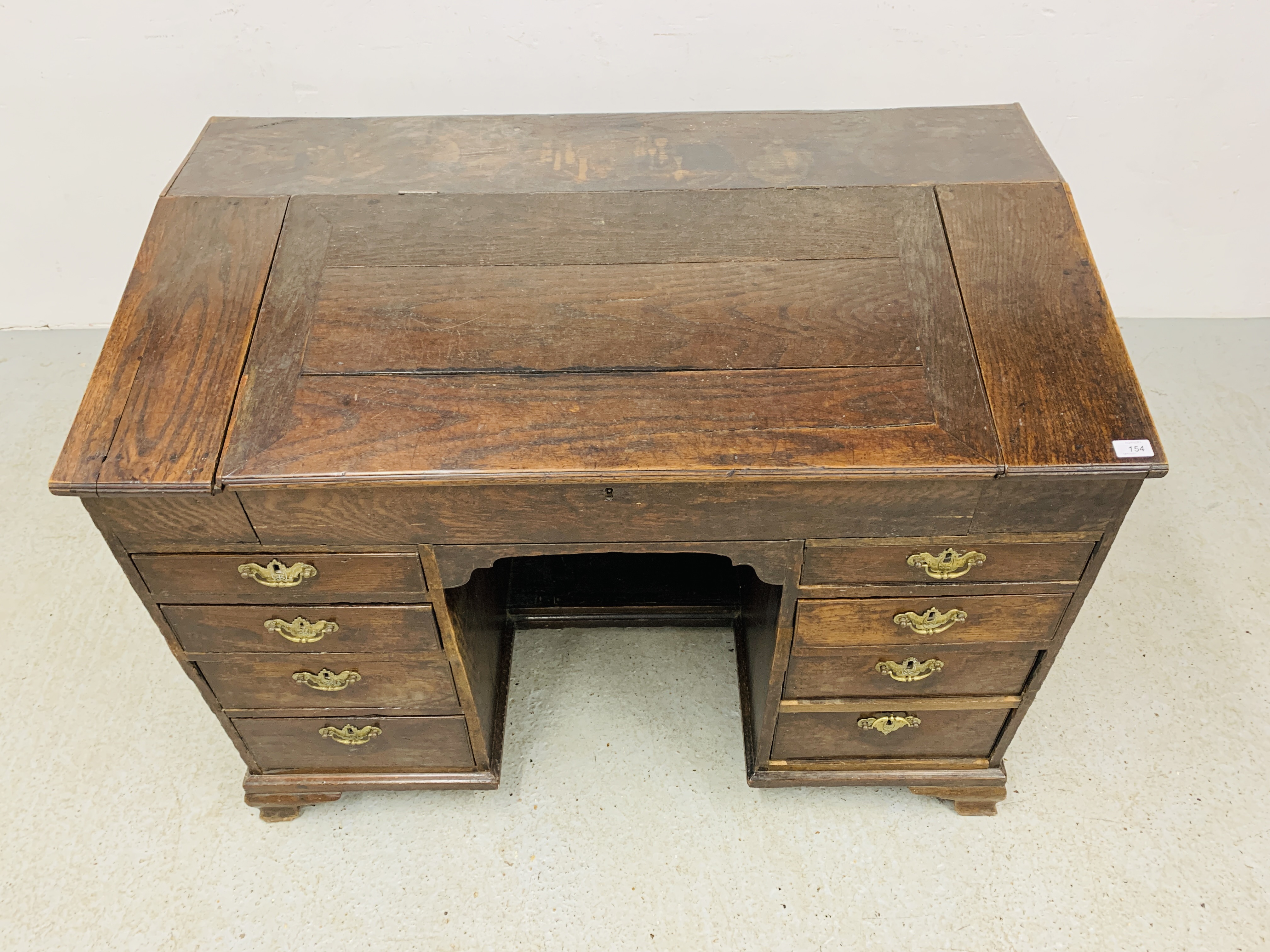 AN C18TH OAK SLOPED TOP KNEEHOLE DESK WITH FITTED INTERIOR AND EIGHT DRAWERS - D 120CM. W 68CM. - Image 3 of 15