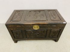 HEAVILY CARVED CAMPHOR WOOD CHEST - THE PANELS WITH ORIENTAL DESIGN