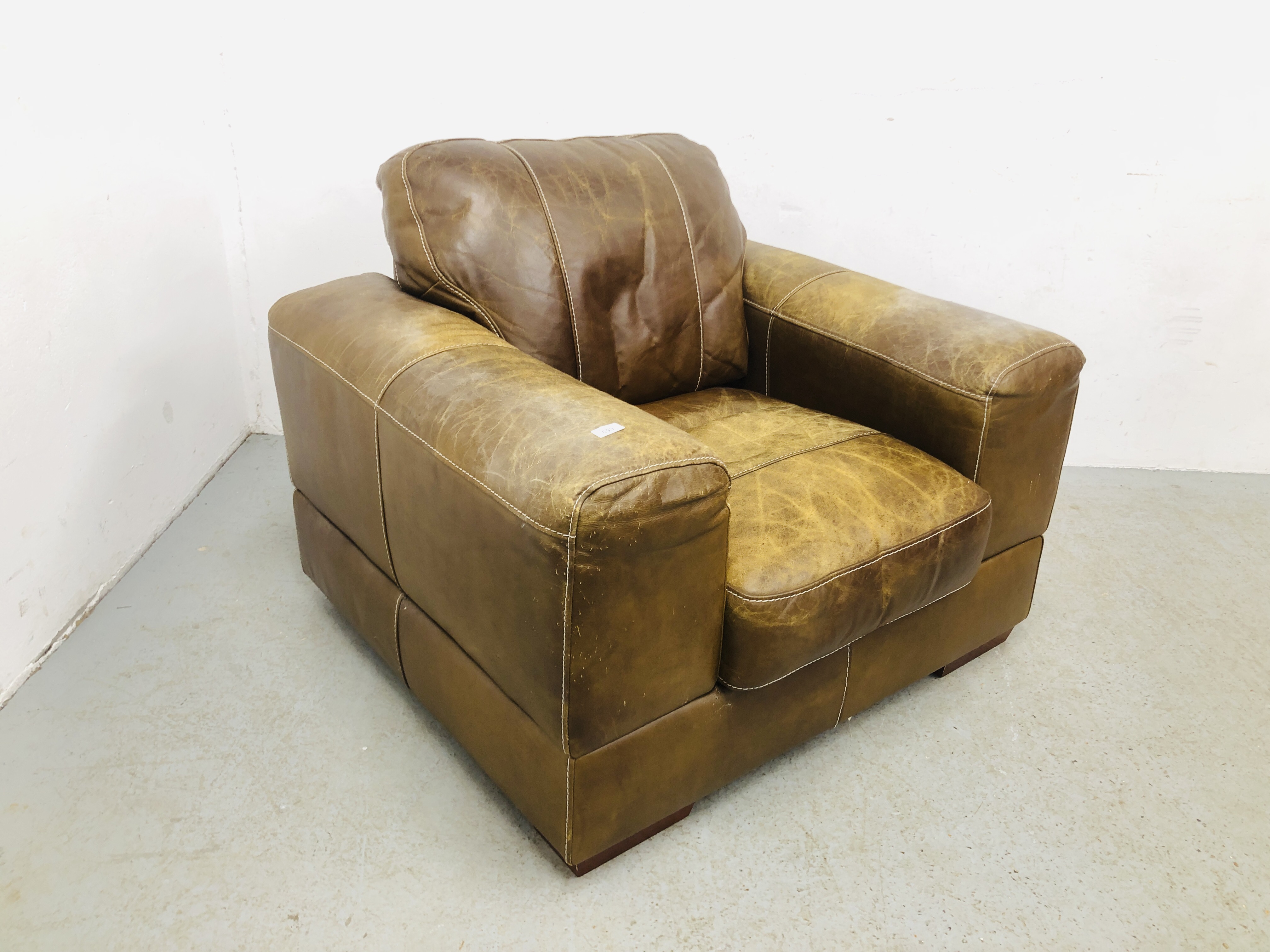 MODERN BROWN LEATHER ARMCHAIR