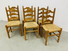A SET OF SIX PINE LADDER BACK TRADITIONAL KITCHEN CHAIRS WITH RUSH SEATS