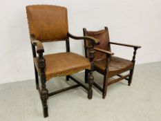 A 1920'S OAK OPEN ARMCHAIR WITH LEATHER SEAT AND BACK (TEARS TO SEAT) + FURTHER OAK FRAMED ARMCHAIR