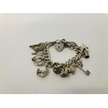 SILVER CHARM BRACELET (15 CHARMS ATTACHED)