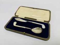 OF GOLFING INTEREST: A SILVER PLATED BUTTER KNIFE AND JAM SPOON IN THE FORM OF GOLF CLUBS