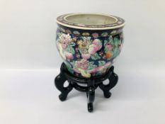 A CHINESE PORCELAIN FISH BOWL ON HARDWOOD STAND