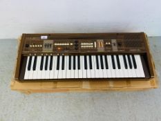 A RETRO CASIO TONE 405 ELECTRONIC KEYBOARD WITH ORIGINAL BOX - SOLD AS SEEN