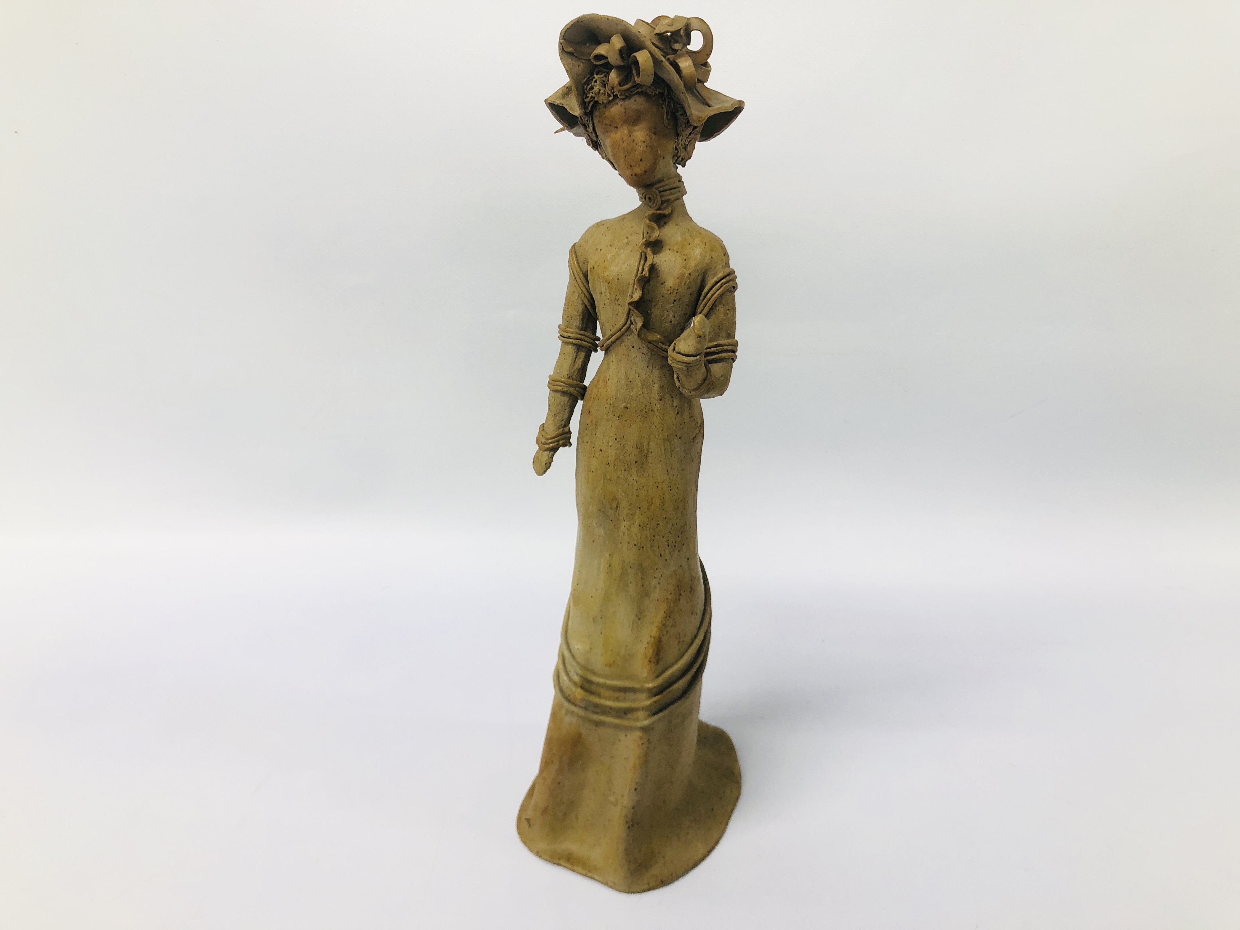 STUDIO POTTERY STUDIO "A FACELESS LADY" BEARING SIGNATURE S.