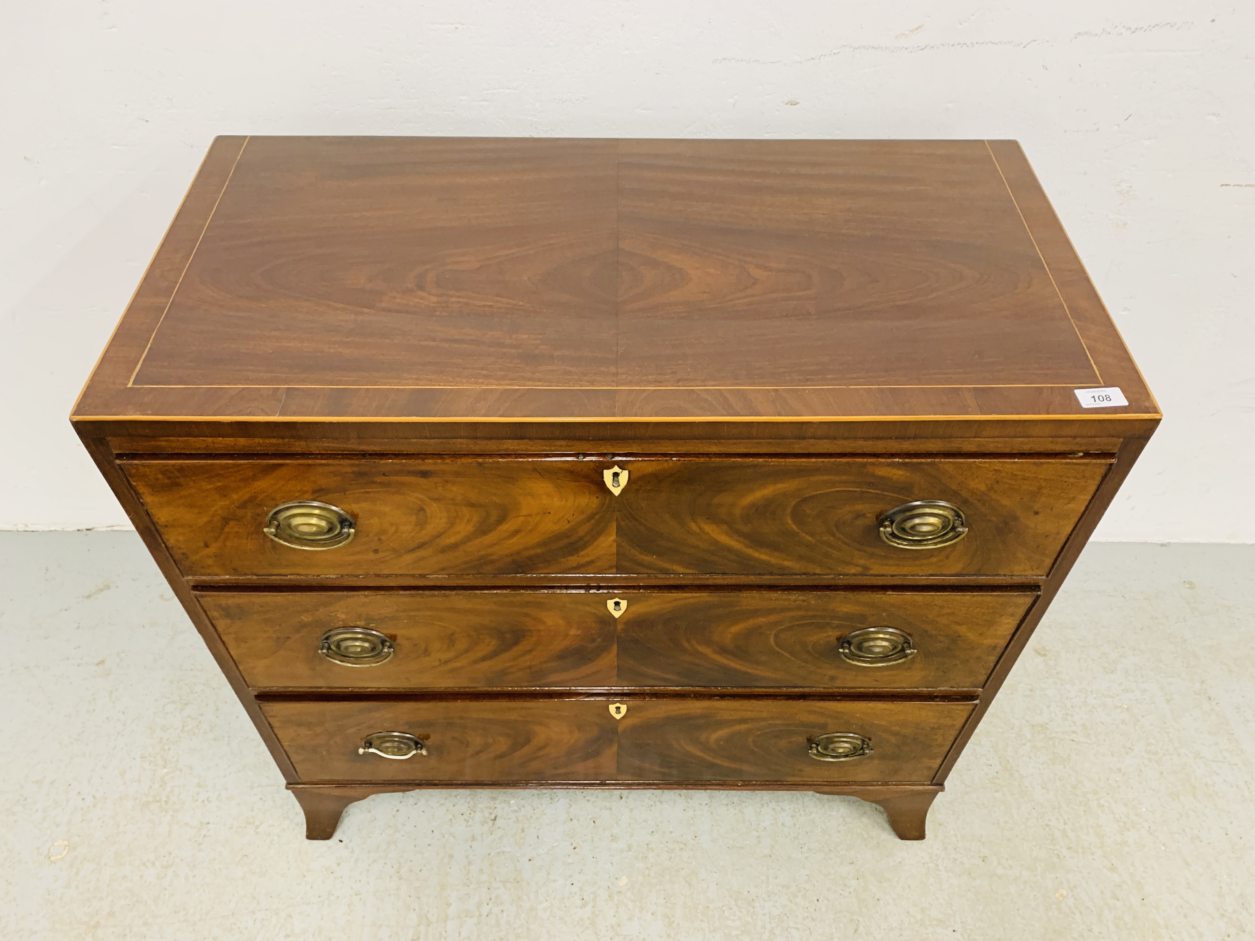 AN EARLY C19TH VINTAGE FLAME MAHOGANY 3 DRAWER CHEST, OVAL BRASS HANDLES ON SPLAYED LEGS - W 89CM. - Image 2 of 10