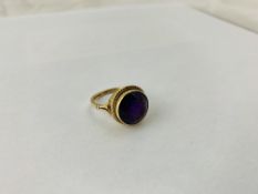 A 9CT GOLD AMETHYST SET RING