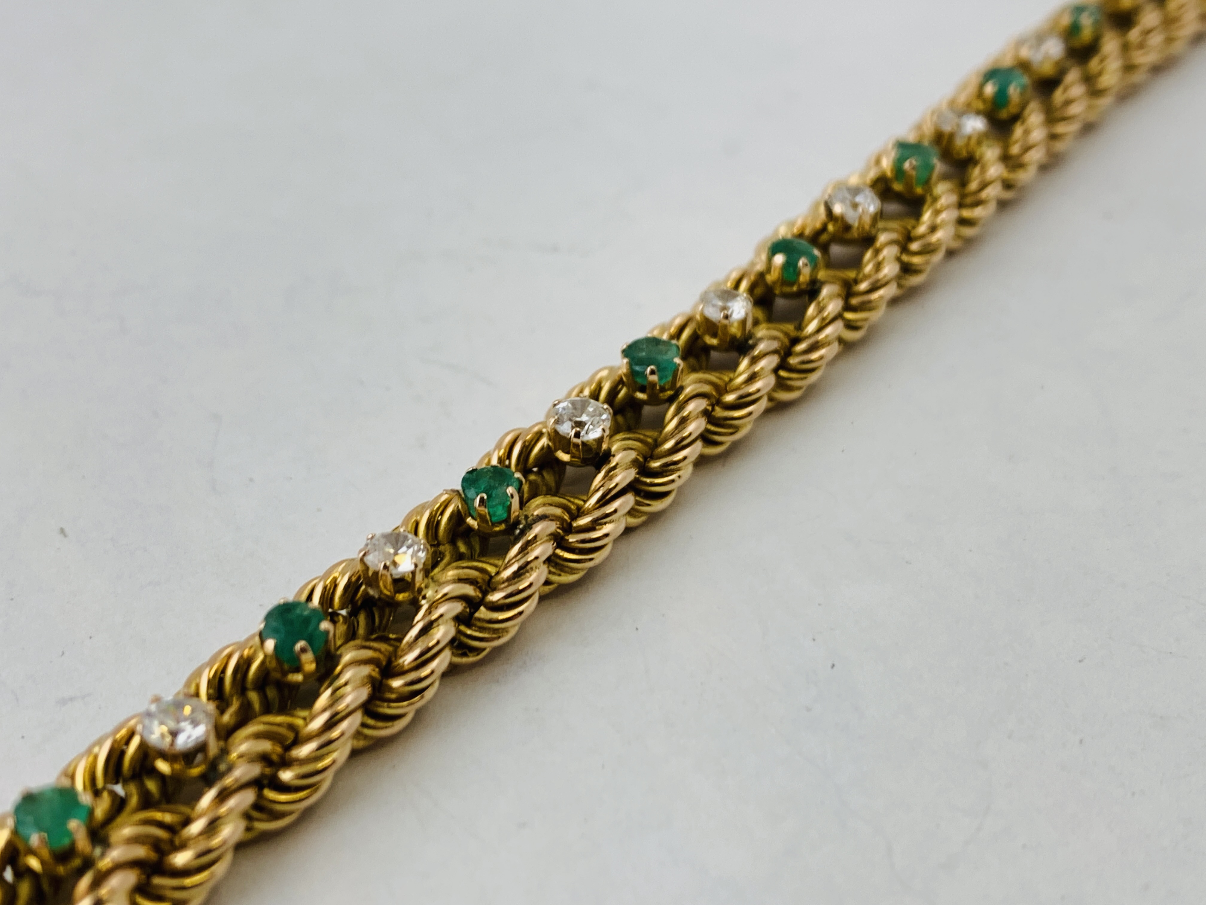 A BRAIDED DIAMOND AND EMERALD BRACELET MARKED 14K, - Image 3 of 7