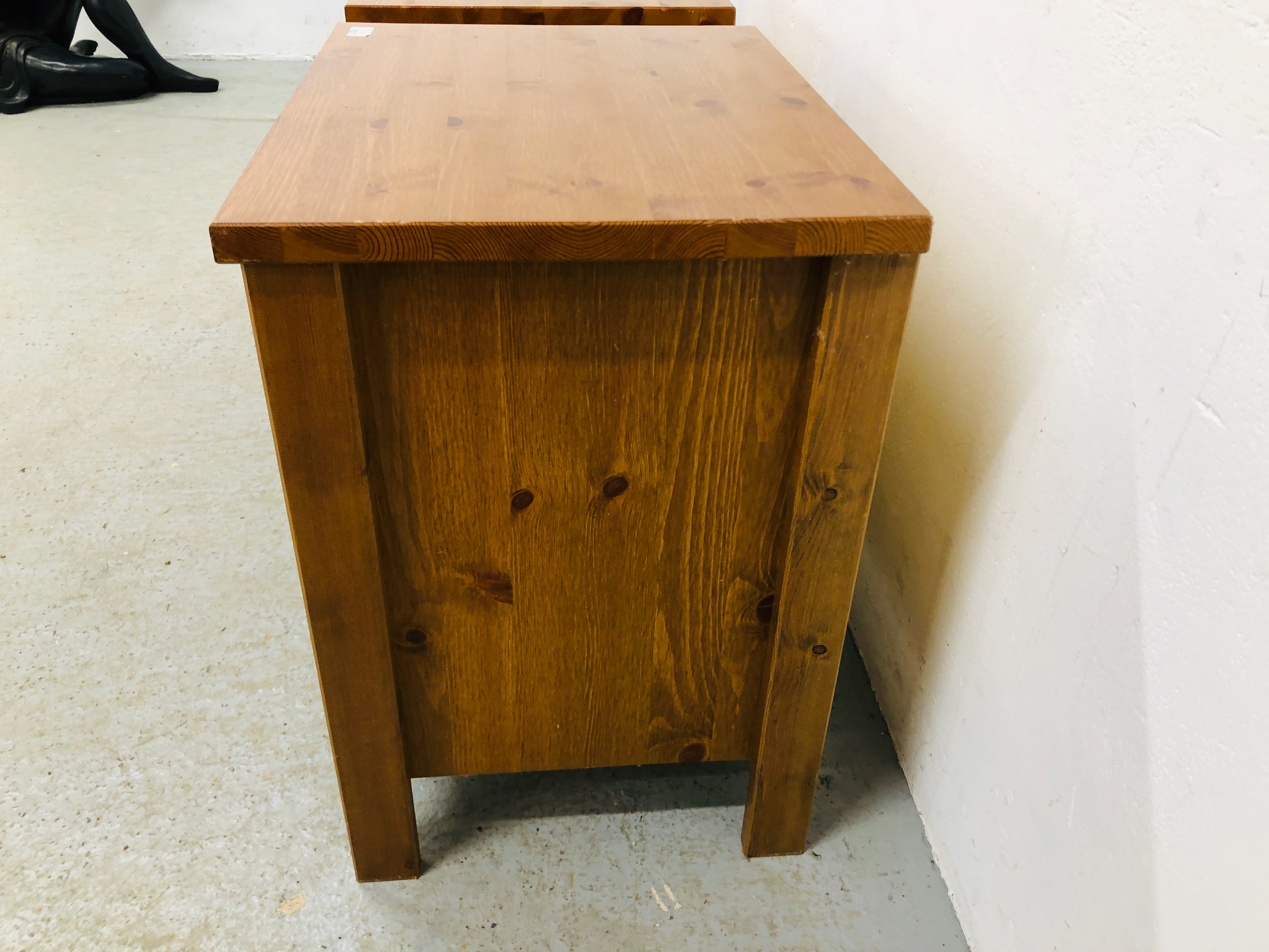 A PAIR OF HONEY PINE THREE DRAWER BEDSIDE CHESTS - W 53CM. D 41CM. H 61CM. - Image 4 of 5