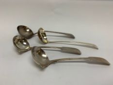 A PAIR OF DUBLIN SILVER TODDY LADLES, A GEORGIAN SCOTTISH SILVER TODDY LADLE,