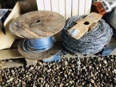 REEL OF BARBED WIRE AND PART ROLL OF BLUE ROPE