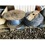 REEL OF BARBED WIRE AND PART ROLL OF BLUE ROPE