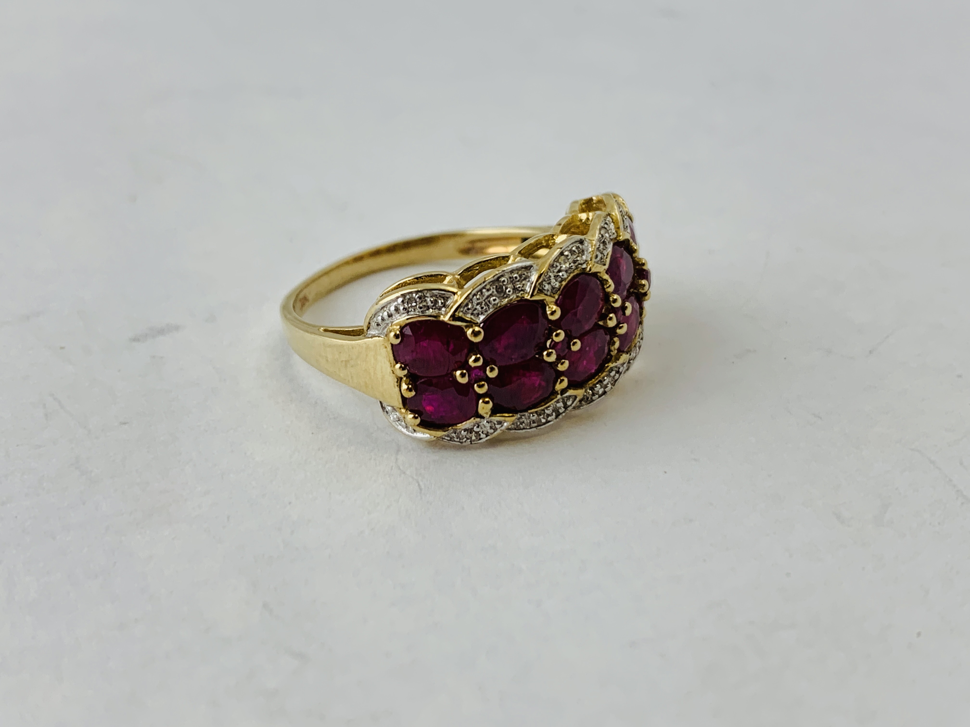 LADIES 9CT GOLD RUBY AND DIAMOND RING THE 10 PRINCIPLE RUBY'S SURROUNDED BY DIAMOND CHIPS SIZE Q/R - Image 5 of 7