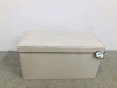 A MODERN UPHOLSTERED OTTOMAN SEAT - L 80CM. D 40CM. H 40CM.