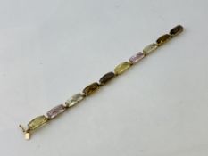 A MODERN DESIGNER BRACELET SET WITH MULTI COLOURED RECTANGLE SEMI PRECIOUS STONES MARKED 375 L