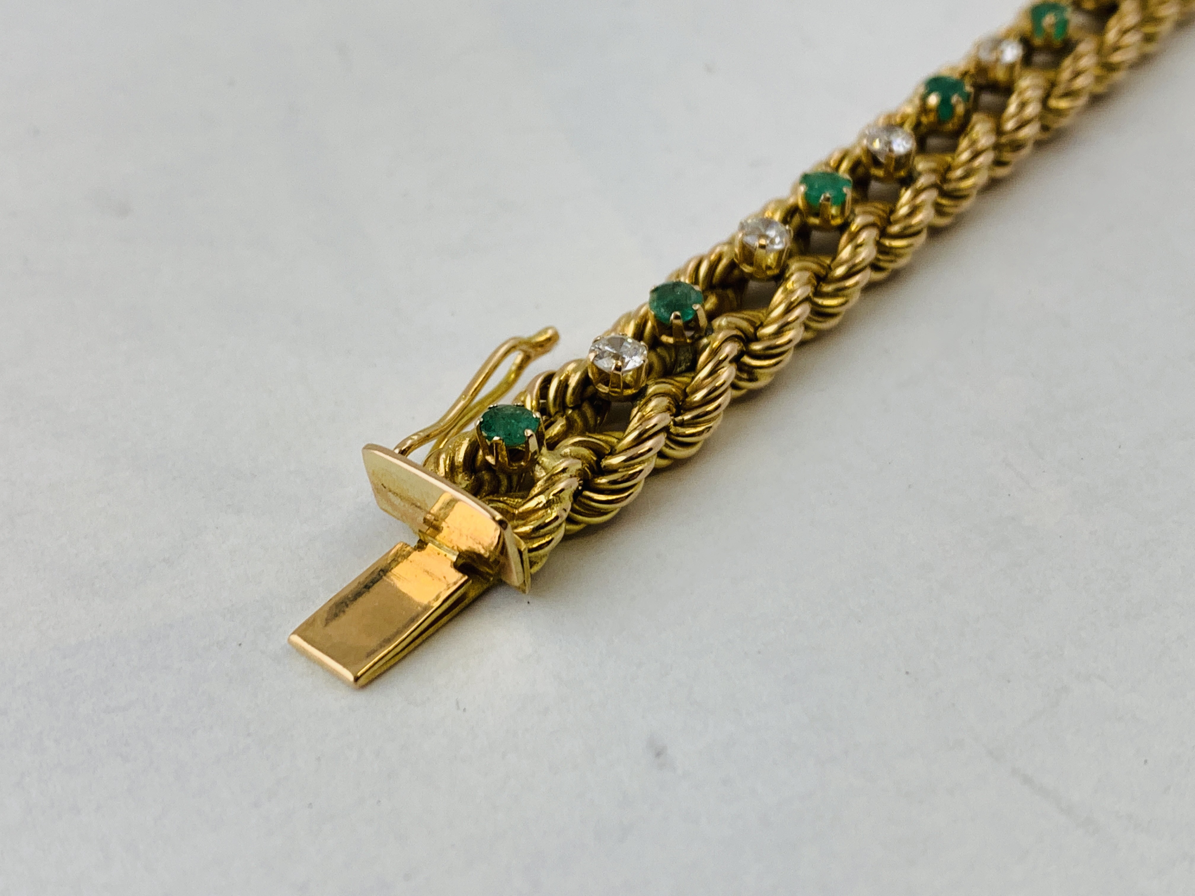 A BRAIDED DIAMOND AND EMERALD BRACELET MARKED 14K, - Image 2 of 7