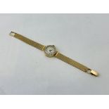 LADIES 18CT GOLD CASED WRIST WATCH ON 9CT GOLD BRAIDED STRAP THE BEZEL SET WITH 36 DIAMONDS THE