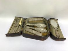 A C19TH SILVER-MOUNTED TRAVELLING DRESSING SET, 4 BRUSHES, A MIRROR, A GLOVE STRETCHER, A SHOE HORN,