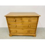 WAXED PINE TWO OVER TWO DRAWER CHEST WITH TURNED HANDLES - W 107CM. D 55CM. H 87CM.