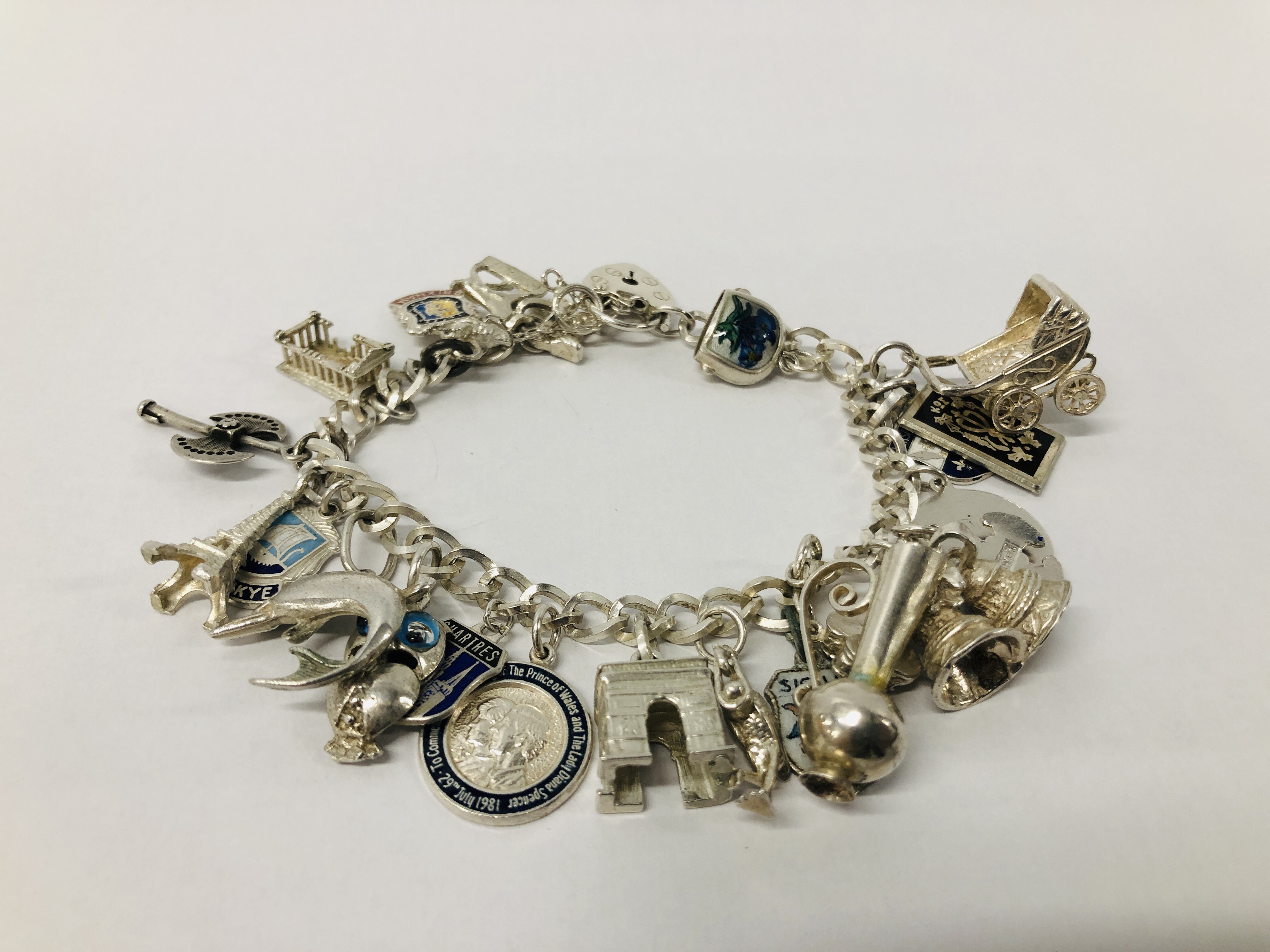 SILVER CHARM BRACELET WITH MULTIPLE CHARMS