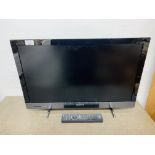 A SONY 26 INCH TV MODEL KDL-26EX320 COMPLETE WITH REMOTE - SOLD AS SEEN