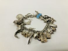 SILVER CHARM BRACELET WITH VARIOUS CHARMS INCLUDING POPEYE