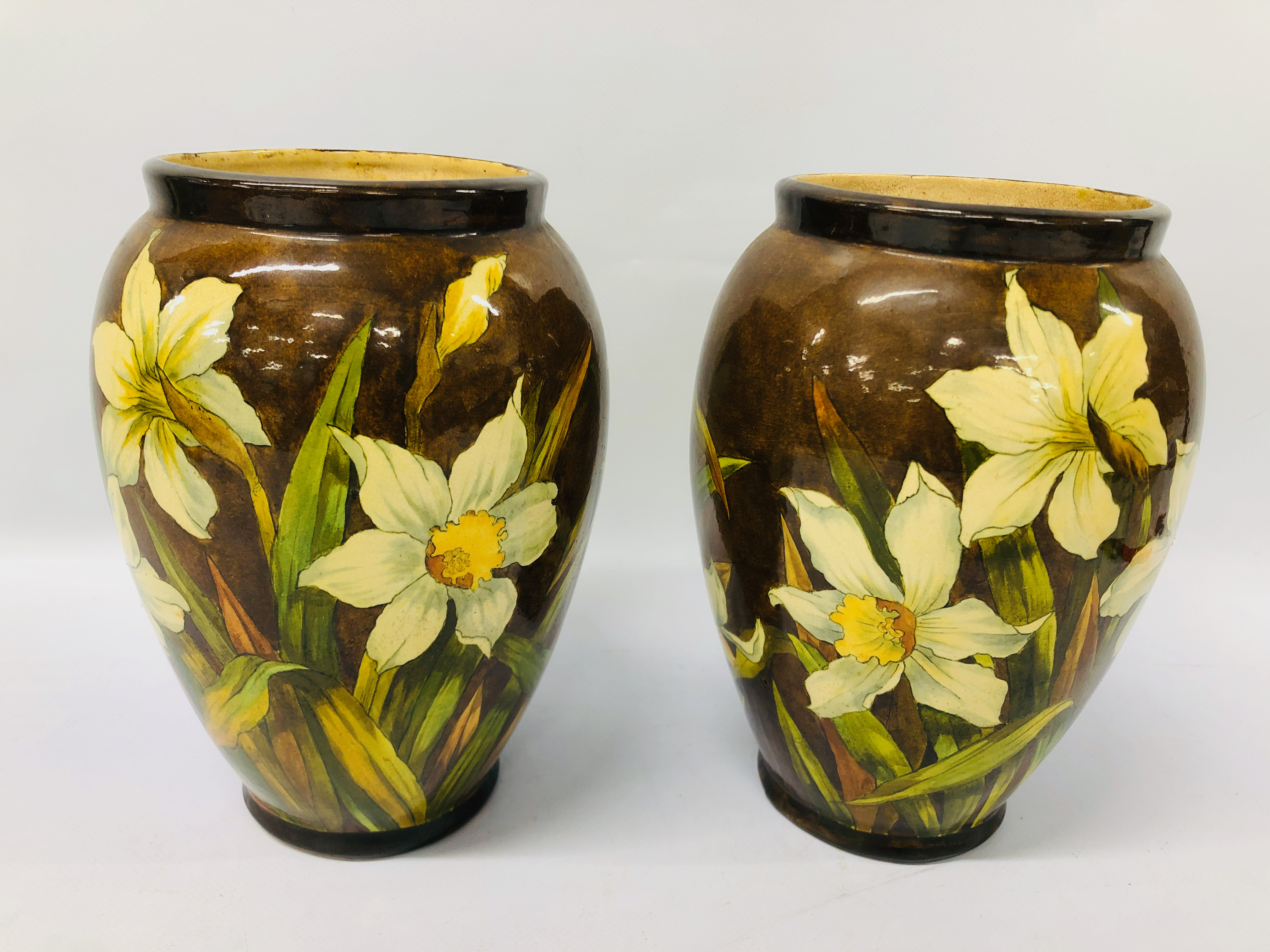 PAIR OF IMPRESSIVE GLAZED VASES, DAFFODIL DESIGN BEARING MAKERS INITIALS - LFS / 83 - H 22CM.