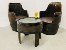 AN OAK WHISKY BARREL SEATING SET COMPRISING TWO BARREL SEATS AND BARREL TABLE