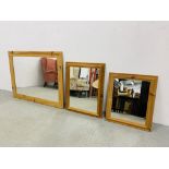 A LARGE PINE FRAMED MIRROR + 2 SMALLER PINE FRAMED MIRRORS (LARGEST 116CM X 86CM)