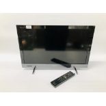A SONY 24 INCH TELEVISION WITH REMOTE - SOLD AS SEEN
